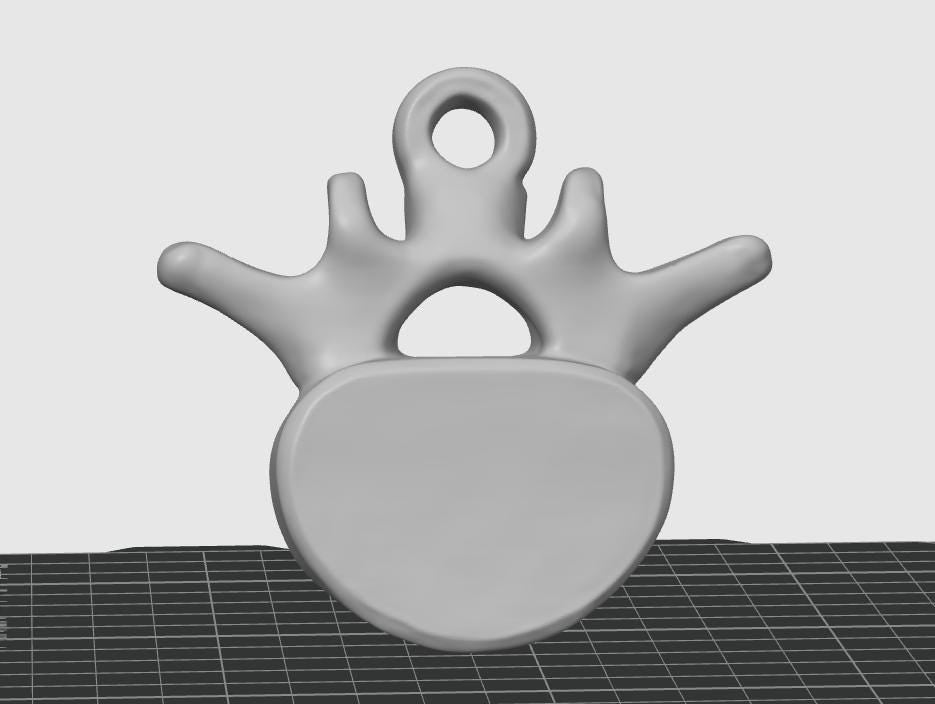 Anatomical Lumbar Vertebrae Keychain | Realistic Human Bone Sculpture (70mm)