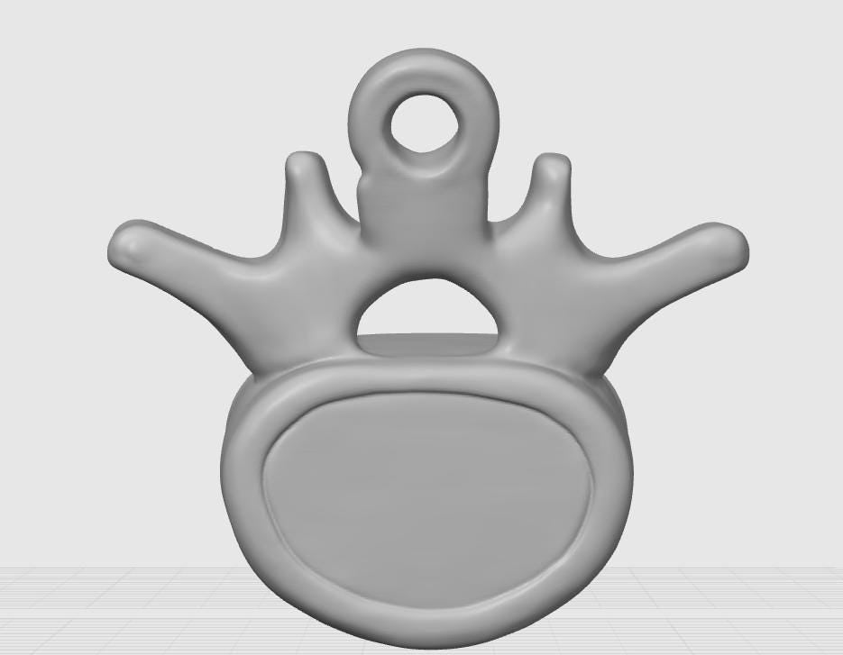 Anatomical Lumbar Vertebrae Keychain | Realistic Human Bone Sculpture (70mm)
